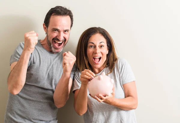 Middle Age Couple Woman Man Holding Piggy Bank Screaming Proud — Stock Photo, Image