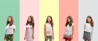 Esmer Latin kız giyiyor farklı kıyafetler seksi bir ifadeyle, neşeli ve mutlu yüzünü kameraya bakarak göz kırpıyor kolaj.