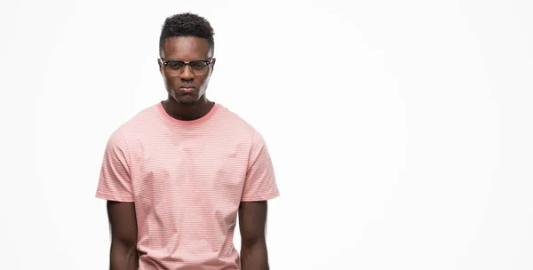 Jovem Afro Americano Vestindo Camiseta Rosa Cético Nervoso Franzindo Testa — Fotografia de Stock