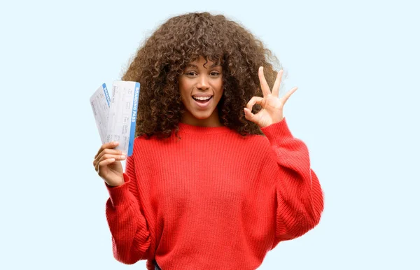 African American Woman Holding Airline Boarding Pass Tickets Doing Sign — Stock Photo, Image