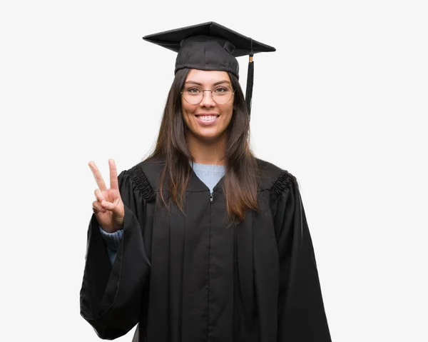 Young Hispanic Woman Wearing Graduated Cap Uniform Showing Pointing Fingers — Stock Photo, Image