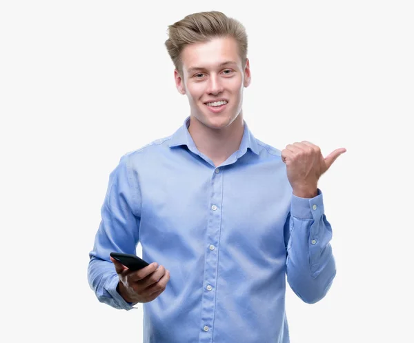 Young Handsome Blond Man Using Smartphone Pointing Hand Finger Happy — Stock Photo, Image