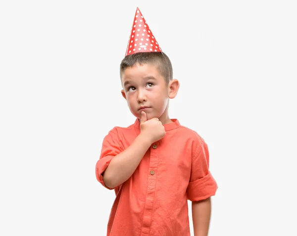 Dark Haired Little Child Wearing Birthday Cap Serious Face Thinking — Stock Photo, Image