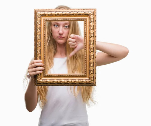 Blonde Teenager Woman Holding Vintage Frame Art Angry Face Negative — Stock Photo, Image