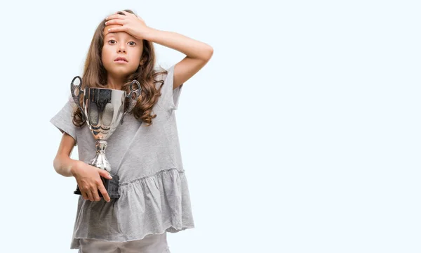 Brunette Hispanic Girl Holding Trophy Stressed Hand Head Shocked Shame — Stock Photo, Image