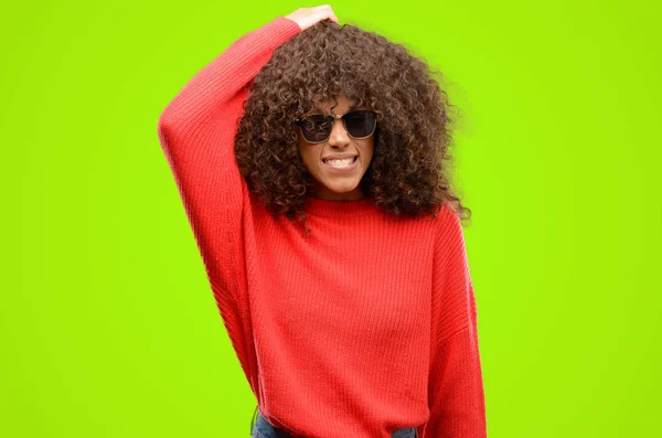 African American Woman Wearing Sunglasses Doubt Expression Confuse Wonder Concept — Stock Photo, Image