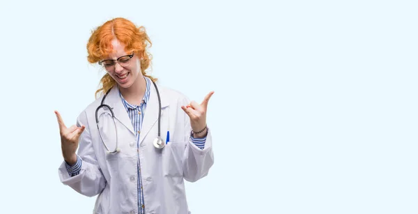 Young Redhead Woman Wearing Doctor Uniform Shouting Crazy Expression Doing — Stock Photo, Image