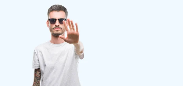 Young Tattooed Adult Man Wearing Sunglasses Open Hand Doing Stop — Stock Photo, Image