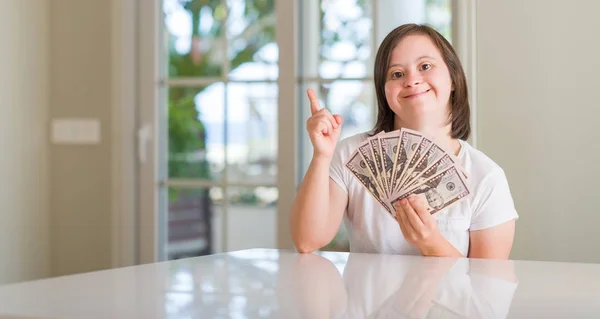 Syndrome Woman Home Holding Dollars Surprised Idea Question Pointing Finger — Stock Photo, Image