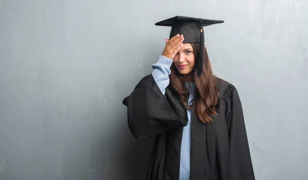 Young Brunette Woman Grunge Grey Wall Wearing Graduate Uniform Stressed — Stock Photo, Image