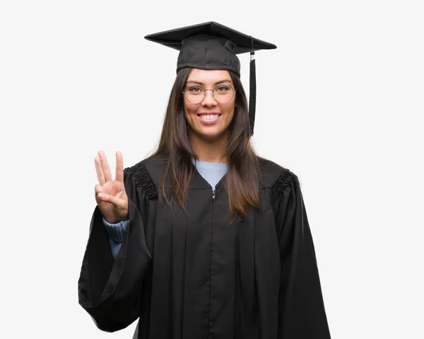 Young Hispanic Woman Wearing Graduated Cap Uniform Showing Pointing Fingers — Stock Photo, Image