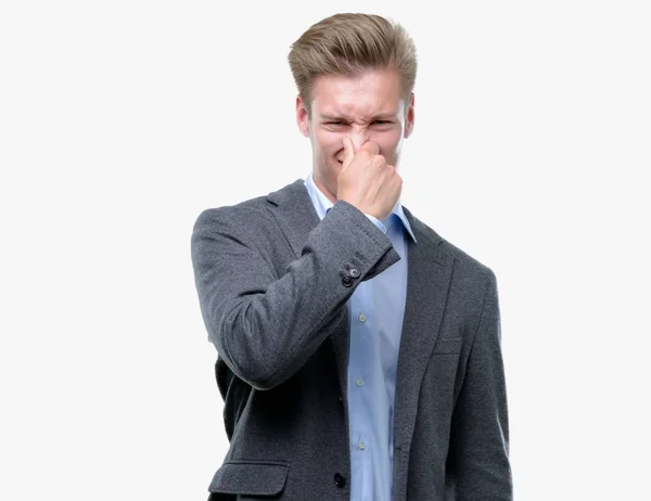 Young Handsome Blond Business Man Smelling Something Stinky Disgusting Intolerable — Stock Photo, Image