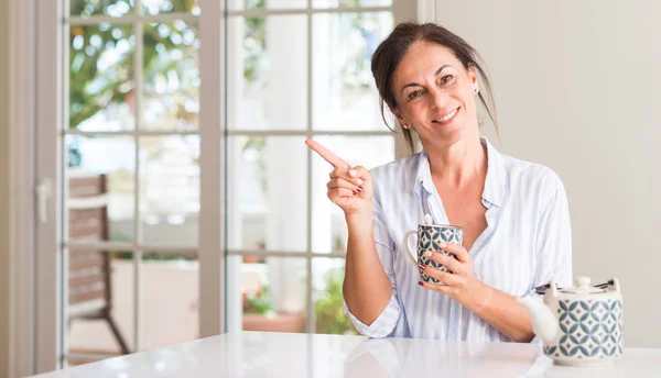 Middle Aged Woman Drinking Cup Tea Coffee Very Happy Pointing — Stock Photo, Image