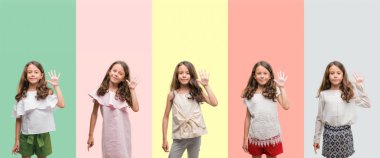 Kolaj gösterilen ve parmakları ile işaret farklı kıyafetler giymiş esmer Latin kız kendinden emin ve mutlu gülümseyerek süre beş numara.