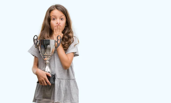 Brunette Hispanic Girl Holding Trophy Cover Mouth Hand Shocked Shame — Stock Photo, Image