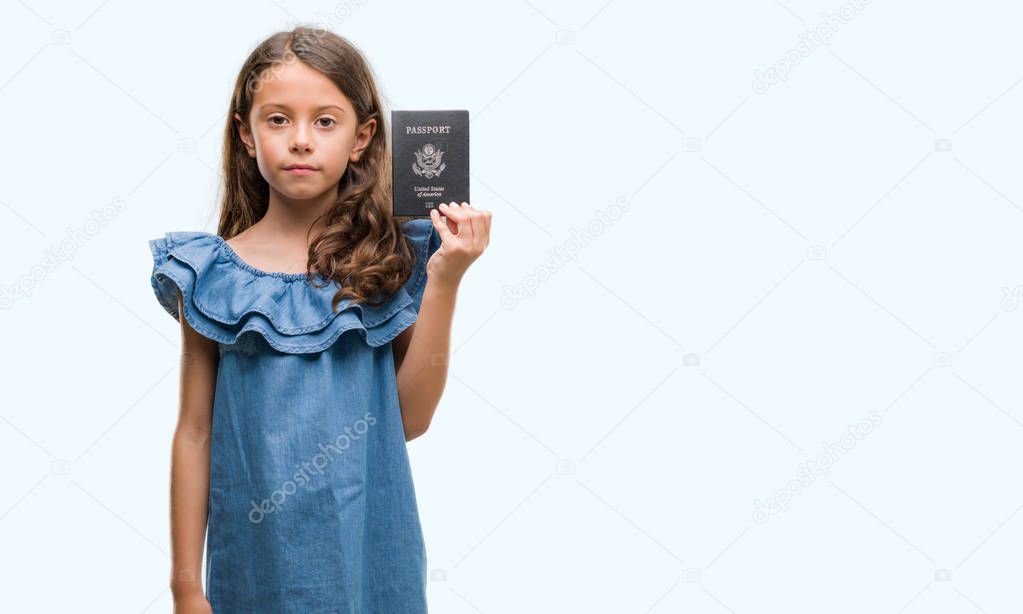 Brunette hispanic girl holding passport of United States of America with a confident expression on smart face thinking serious