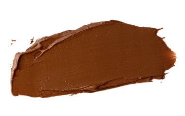 Çikolata beyaz arka planda izole bir şekilde yayılmış. Lezzetli yemek tasarımı