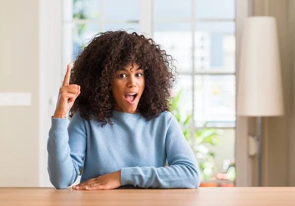 African American Woman Home Pointing Finger Successful Idea Exited Happy — Stock Photo, Image