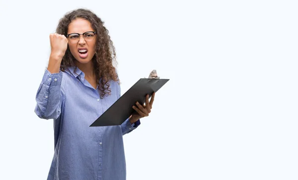 Young Hispanic Business Woman Holding Clipboard Annoyed Frustrated Shouting Anger — Stock Photo, Image
