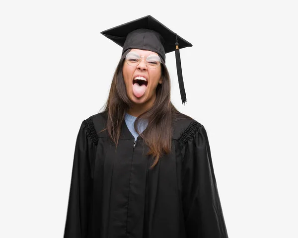 Joven Mujer Hispana Con Gorra Graduada Uniforme Sacando Lengua Feliz —  Fotos de Stock