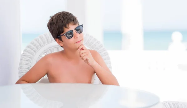 Young Child Holidays Sitting Chair Beach Serious Face Thinking Question — Stock Photo, Image