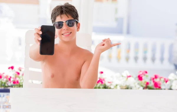 Young Child Holidays Showing Smartphone Very Happy Pointing Hand Finger — Stock Photo, Image