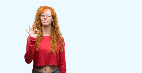 Young Redhead Woman Wearing Glasses Doing Sign Fingers Excellent Symbol — Stock Photo, Image