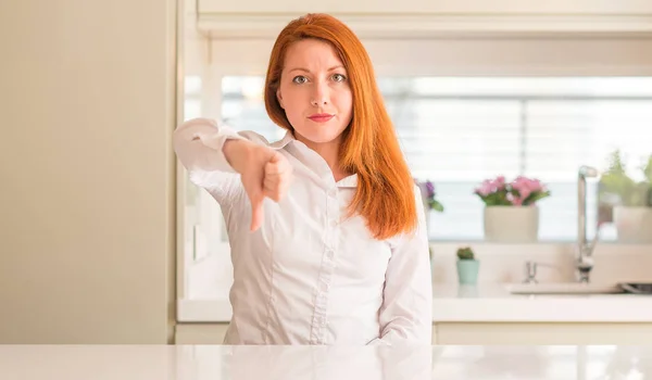 Redhead Woman Kitchen Looking Unhappy Angry Showing Rejection Negative Thumbs — Stock Photo, Image