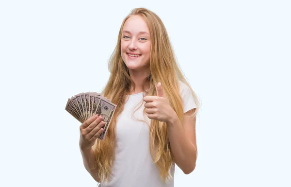 Rubia Adolescente Mujer Sosteniendo Dólares Feliz Con Gran Sonrisa Haciendo — Foto de Stock