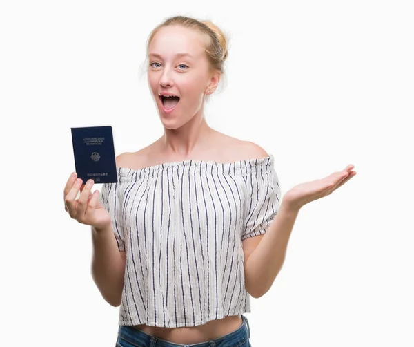 Mulher Adolescente Loira Segurando Passaporte Alemanha Muito Feliz Animado Expressão — Fotografia de Stock