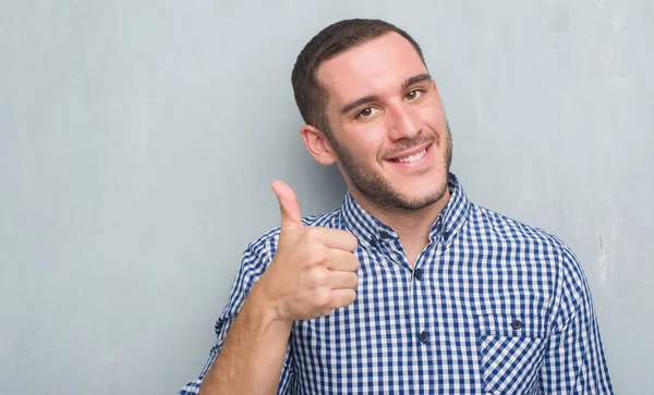 Young Caucasian Man Grey Grunge Wall Happy Big Smile Doing — Stock Photo, Image