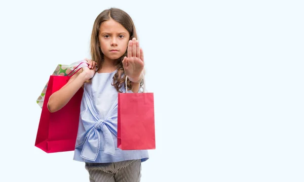 Morena Hispânica Menina Segurando Sacos Compras Com Mão Aberta Fazendo — Fotografia de Stock