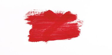 Beyaz arka plan üzerinde izole kırmızı fırça darbesi