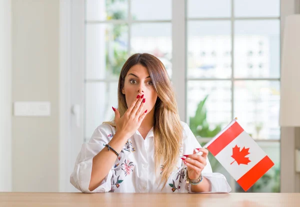 Young Woman Home Holding Flag Canada Cover Mouth Hand Shocked — Stock Photo, Image