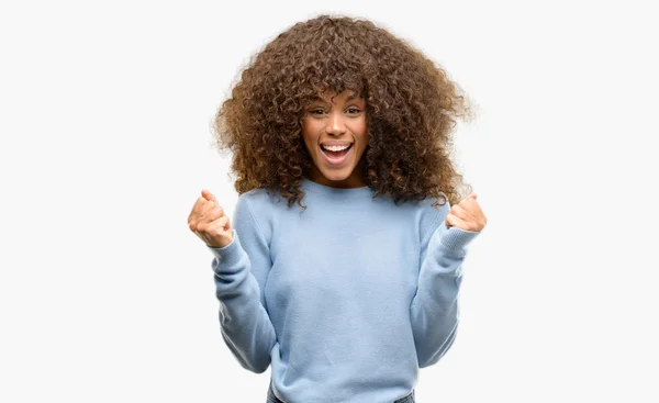 African American Woman Wearing Sweater Celebrating Surprised Amazed Success Arms — Stock Photo, Image