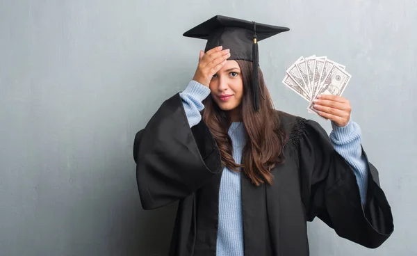 Young Brunette Woman Grunge Grey Wall Wearing Graduate Uniform Holding — Stock Photo, Image