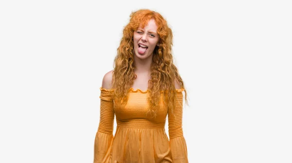 Unga Rödhårig Kvinna Fast Tunga Nöjd Med Roliga Uttryck Emotion — Stockfoto