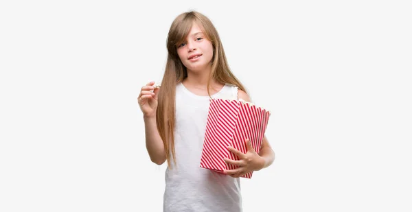 Young Blonde Toddler Holding Popcorn Pack Happy Face Standing Smiling — Stock Photo, Image