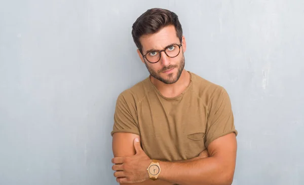 Handsome Young Man Grey Grunge Wall Wearing Glasses Skeptic Nervous — Stock Photo, Image
