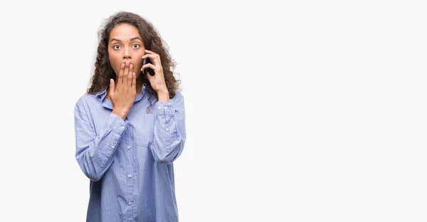 Young Hispanic Woman Using Smartphone Cover Mouth Hand Shocked Shame — Stock Photo, Image