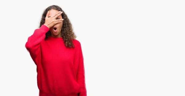 Young Hispanic Woman Wearing Red Sweater Peeking Shock Covering Face — Stock Photo, Image