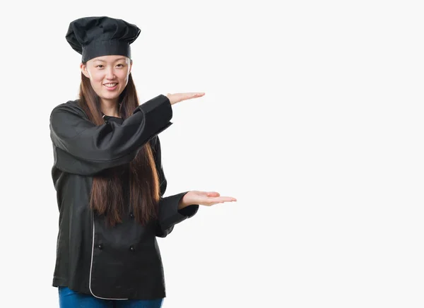 Unga Kinesiska Kvinnan Över Isolerade Bakgrunden Bär Kock Uniform Gestikulerande — Stockfoto