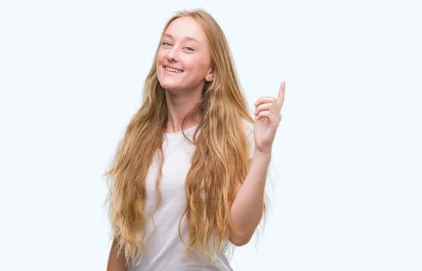 Blonde Teenager Woman Surprised Idea Question Pointing Finger Happy Face — Stock Photo, Image