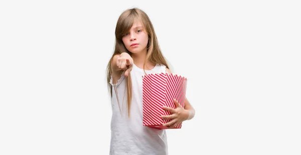 Young Blonde Toddler Holding Popcorn Pack Pointing Finger Camera You — Stock Photo, Image