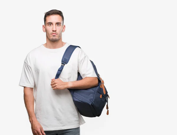 Bonito Jovem Segurando Mochila Com Uma Expressão Confiante Rosto Inteligente — Fotografia de Stock