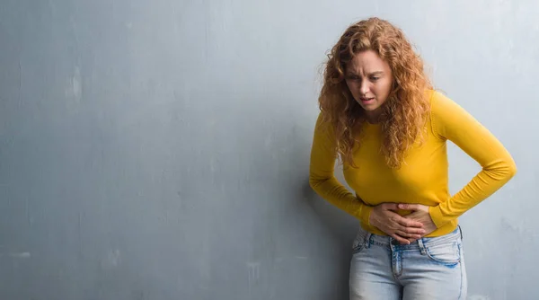 Young Redhead Woman Grey Grunge Wall Hand Stomach Because Indigestion — Stock Photo, Image