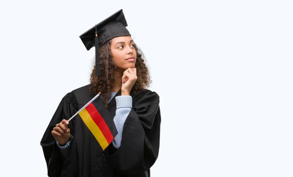 Jeune Femme Hispanique Portant Uniforme Graduation Tenant Drapeau Allemagne Visage — Photo