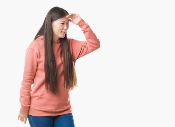 Молода Китайська Жінка Над Ізольованих Фон Носіння Sweathshirt Спорт Дуже — стокове фото
