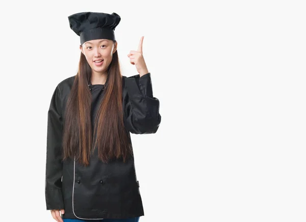 Jovem Chinesa Sobre Fundo Isolado Vestindo Uniforme Chef Apontando Dedo — Fotografia de Stock