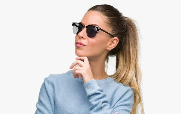 Beautiful Young Woman Wearing Sunglasses Ponytail Serious Face Thinking Question — Stock Photo, Image